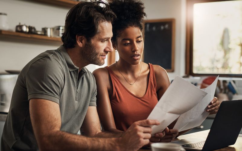 Couple looking at paperwork together